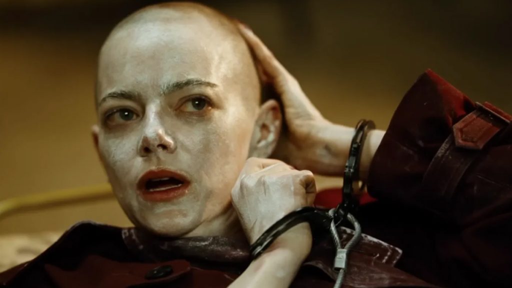 Bugonia still - emma stone with shaven head